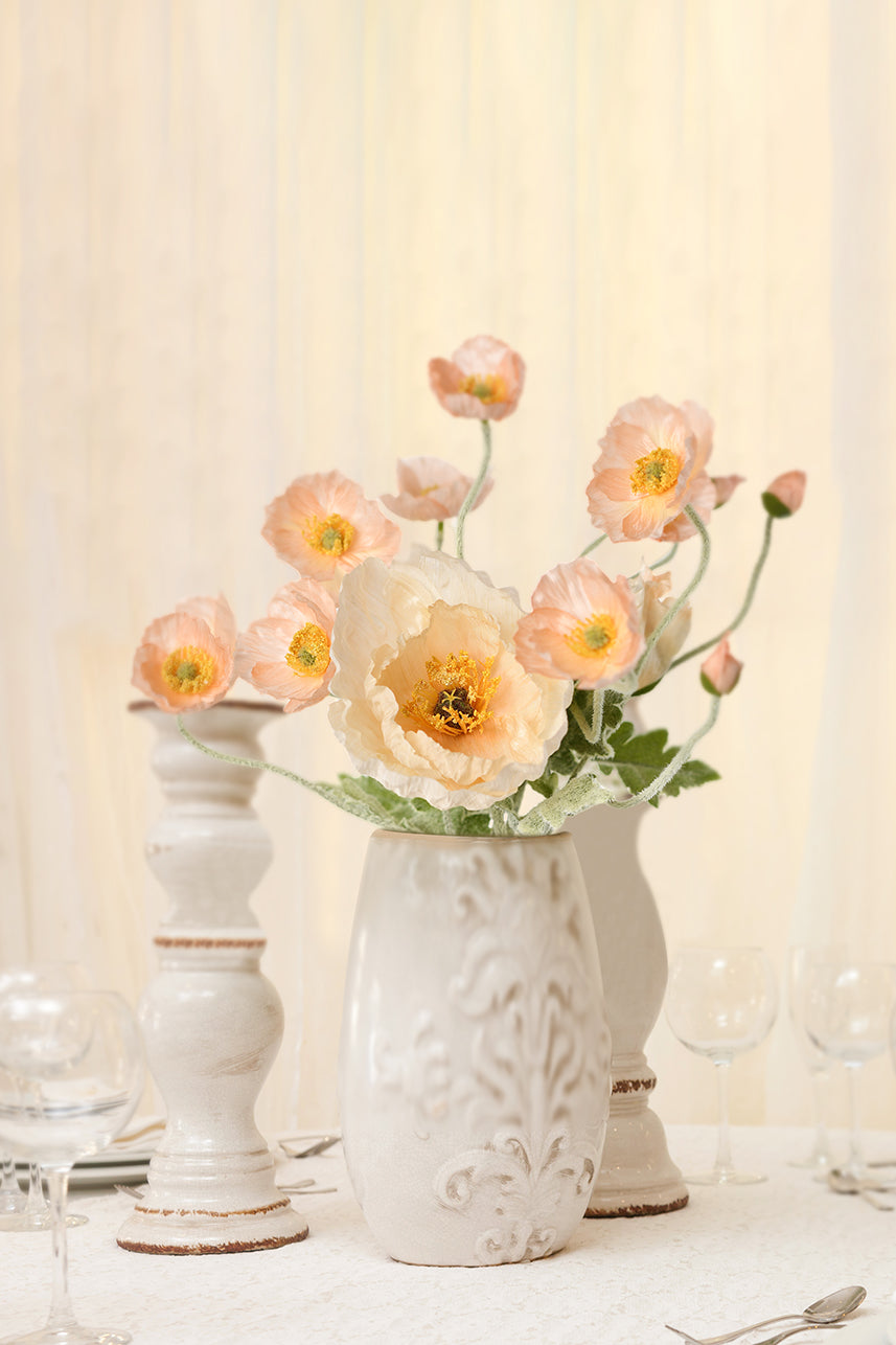 Stunningly realistic artificial peach-colored Iceland poppy flower, adding a touch of elegance to dining room decor.
