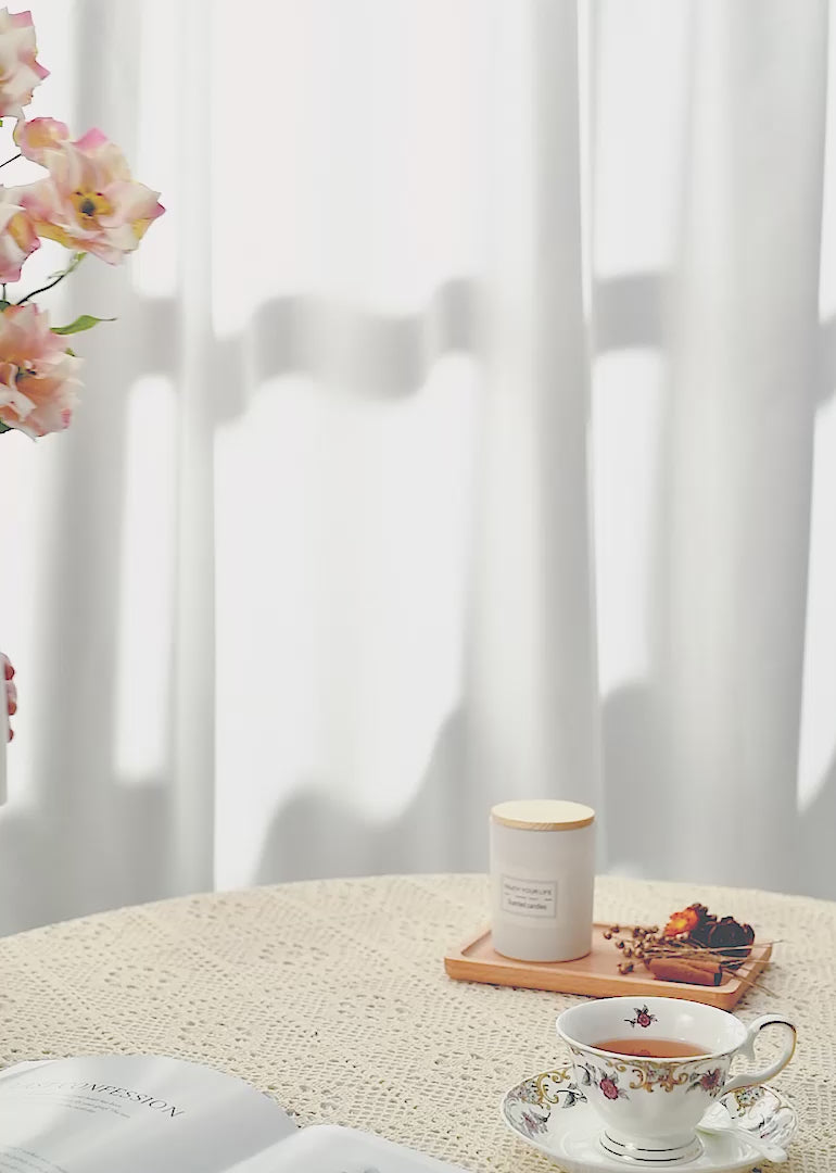 The artificial mauve pink floral arrangement against a white or retro background creates a captivating fusion of modern sophistication and vintage charm.