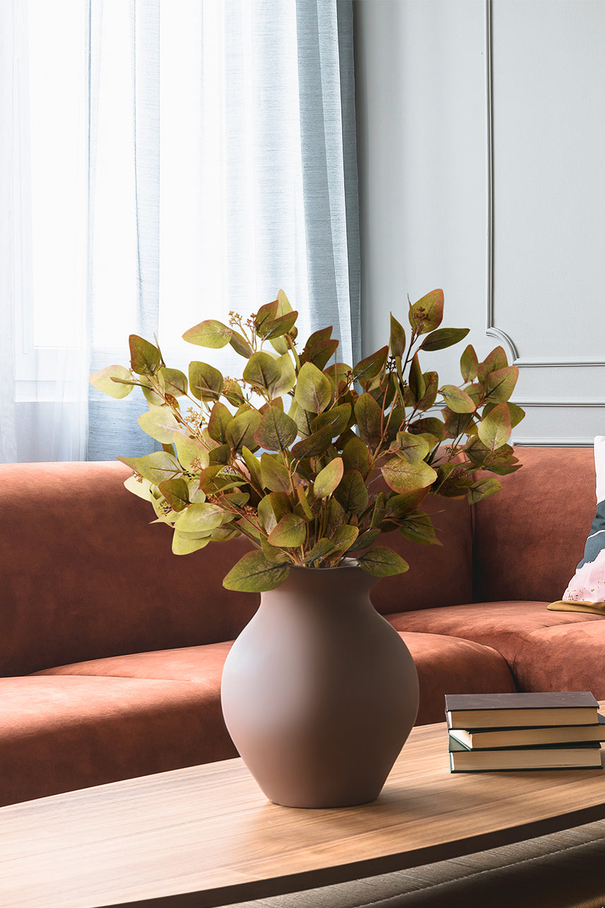 The burgundy green artificial Dutch eucalyptus leaves are especially suitable for a brown vase, and will make a great home decoration when placed on a end table.