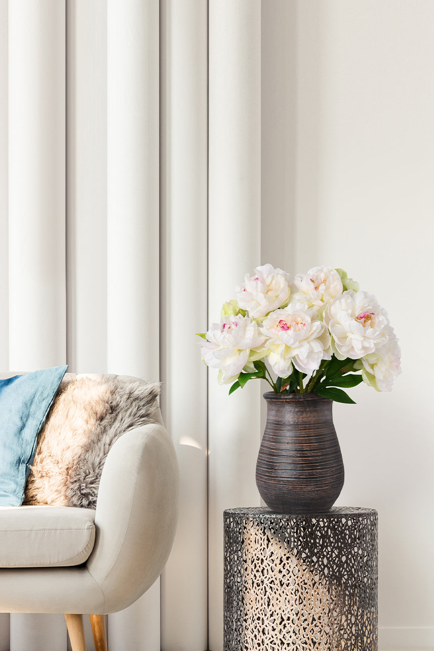 The faux Phoenix peony simulates the effect of a real flower in full bloom, with the stamens wrapped in layers of fake petals to make the flower more realistic.