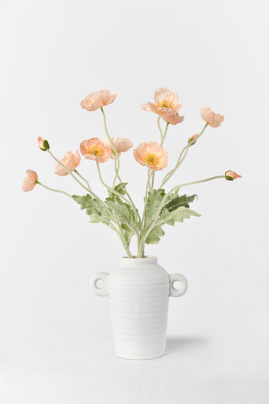 Faux flocking stems with lifelike papaver rhoeas flowers in coral pink. Perfect for creating beautiful floral arrangements or adding a touch of elegance to any space.