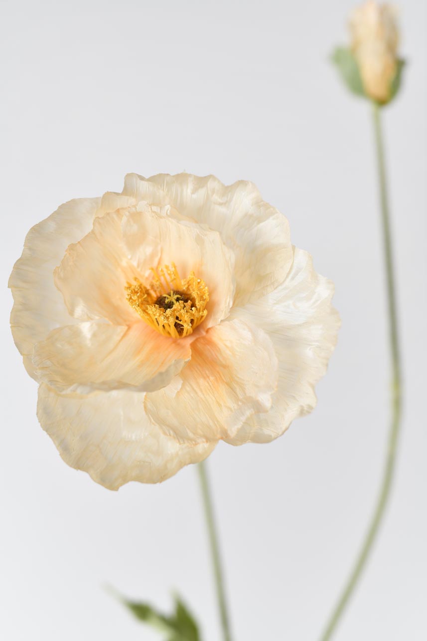 Realistic and beautiful faux Iceland poppy flowers in peach color with a long faux stem, perfect for creating stunning floral arrangements.