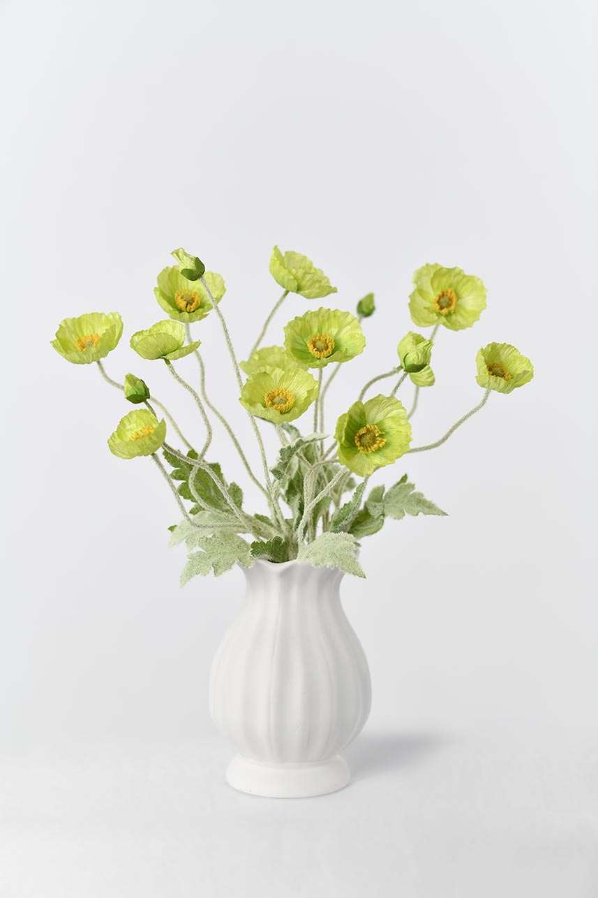A great addition to any kitchen island or countertop with this lifelike and beautiful faux papaver rhoeas flower in soft green color. Its faux stem makes it look natural and realistic.
