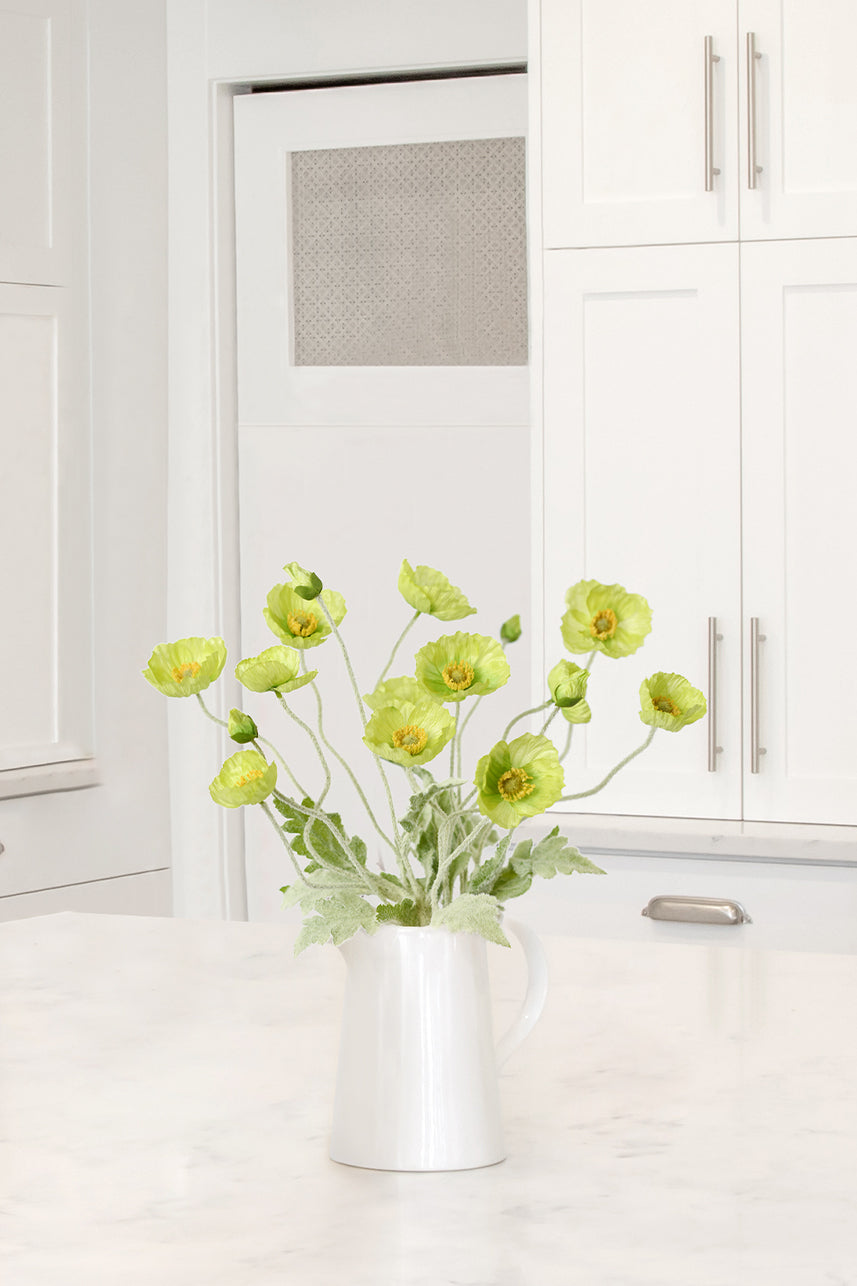 A great addition to any kitchen island or countertop with this lifelike and beautiful faux papaver rhoeas flower in soft green color. Its faux stem makes it look natural and realistic.