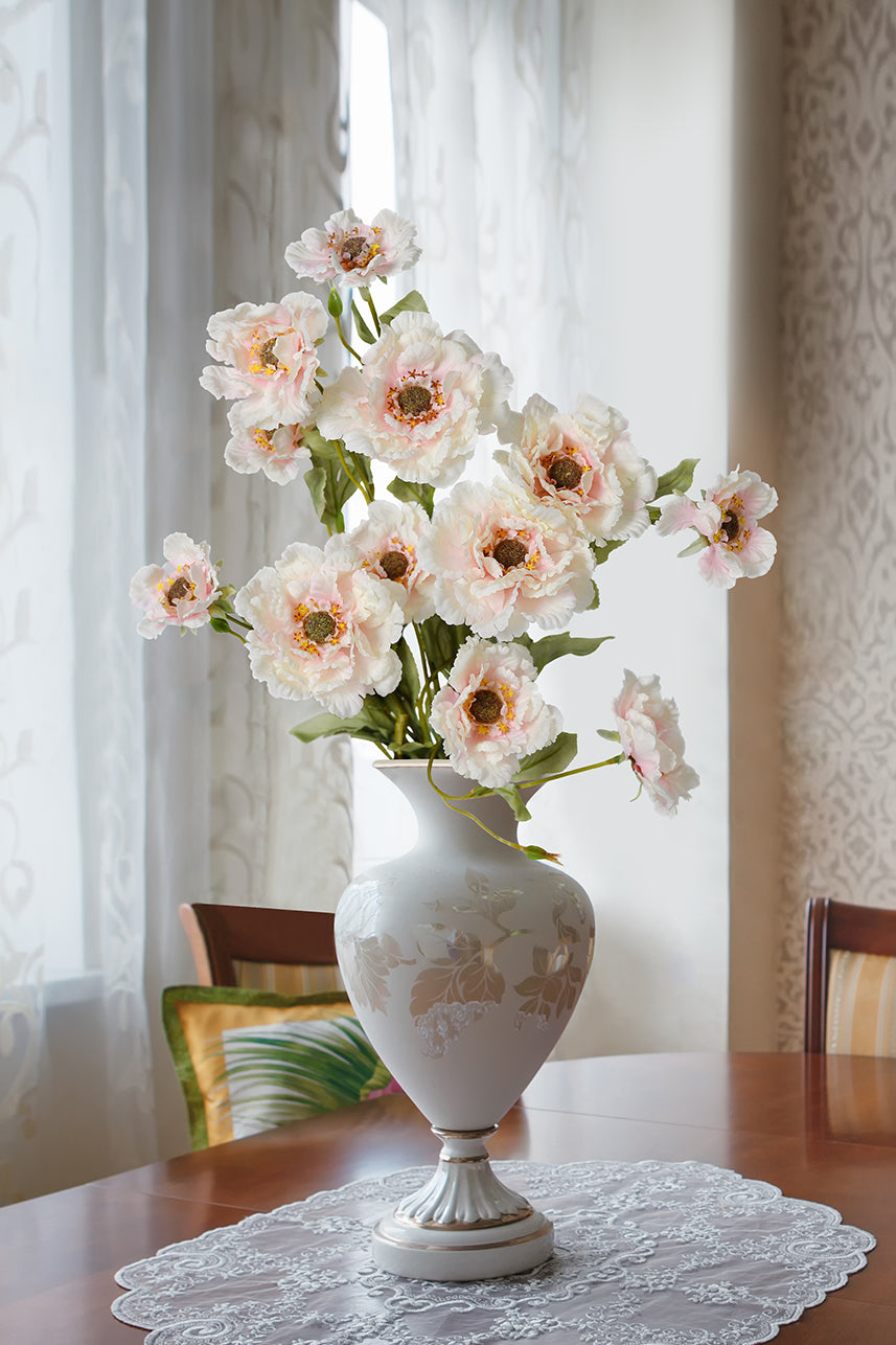 Indulge in the opulence and prosperity represented by the peony, with its lush blooms and vibrant colors. Each intricately designed petal captures the essence of romance and honor.