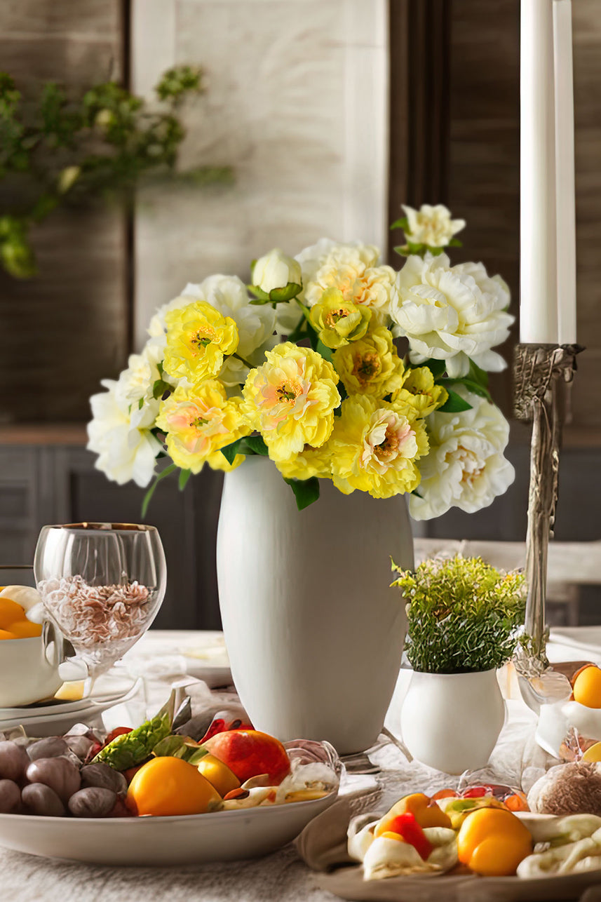 The yellow faux peony with the atmospheric phoenix peony becomes a unique floral arrangement suitable as a home centerpiece.