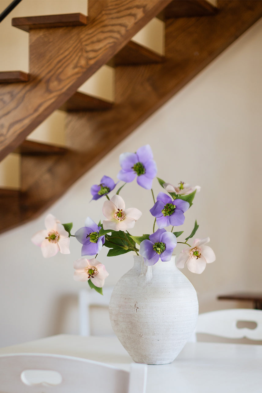 People love the freshness of the faux helleborus flower, and it makes a perfect home decoration when paired with the tiny flowers.