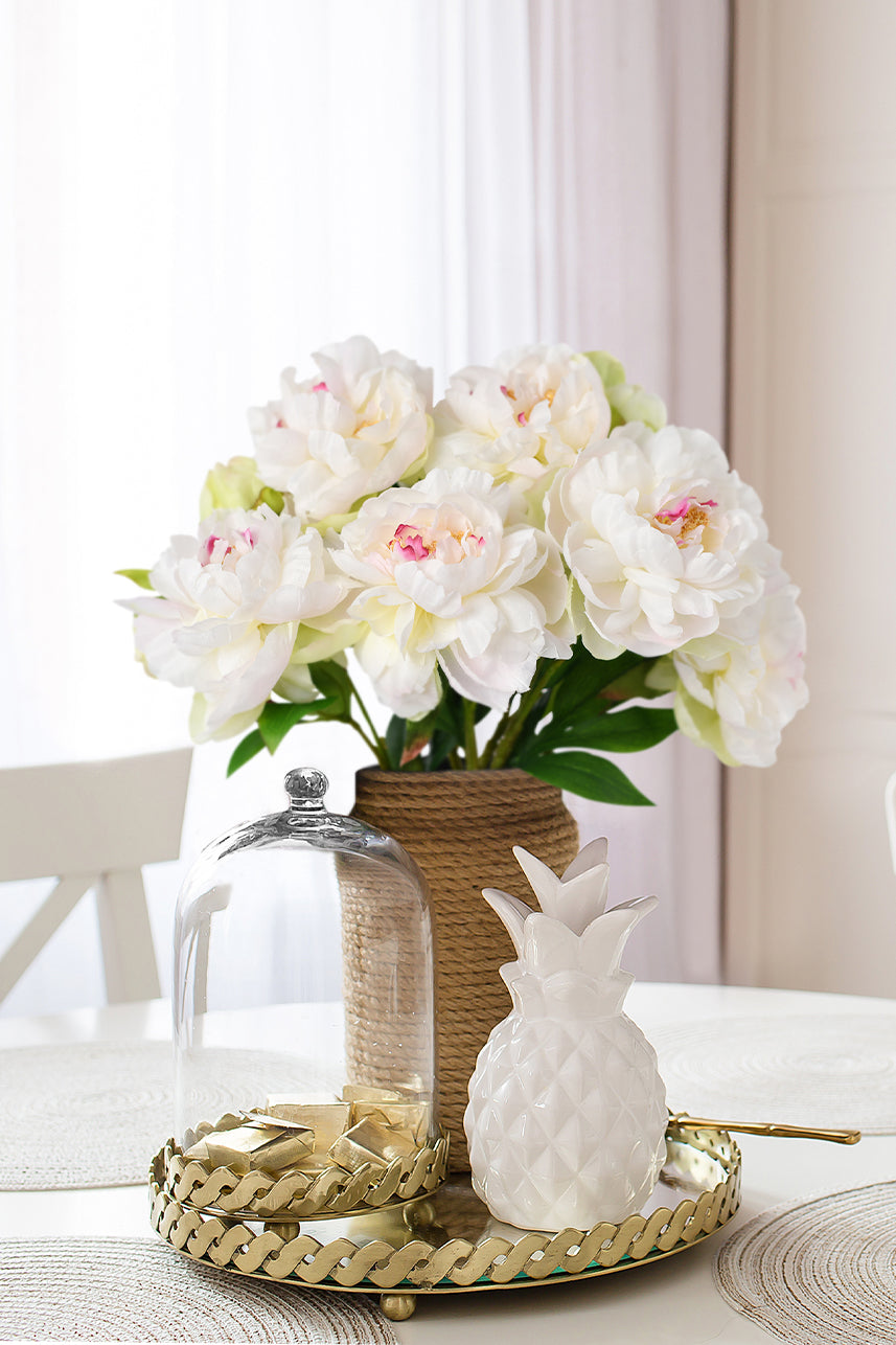 Artificial Phoenix Peony in pink cream adorns the dining table, adding an exquisite touch to the decor with its elegant beauty.