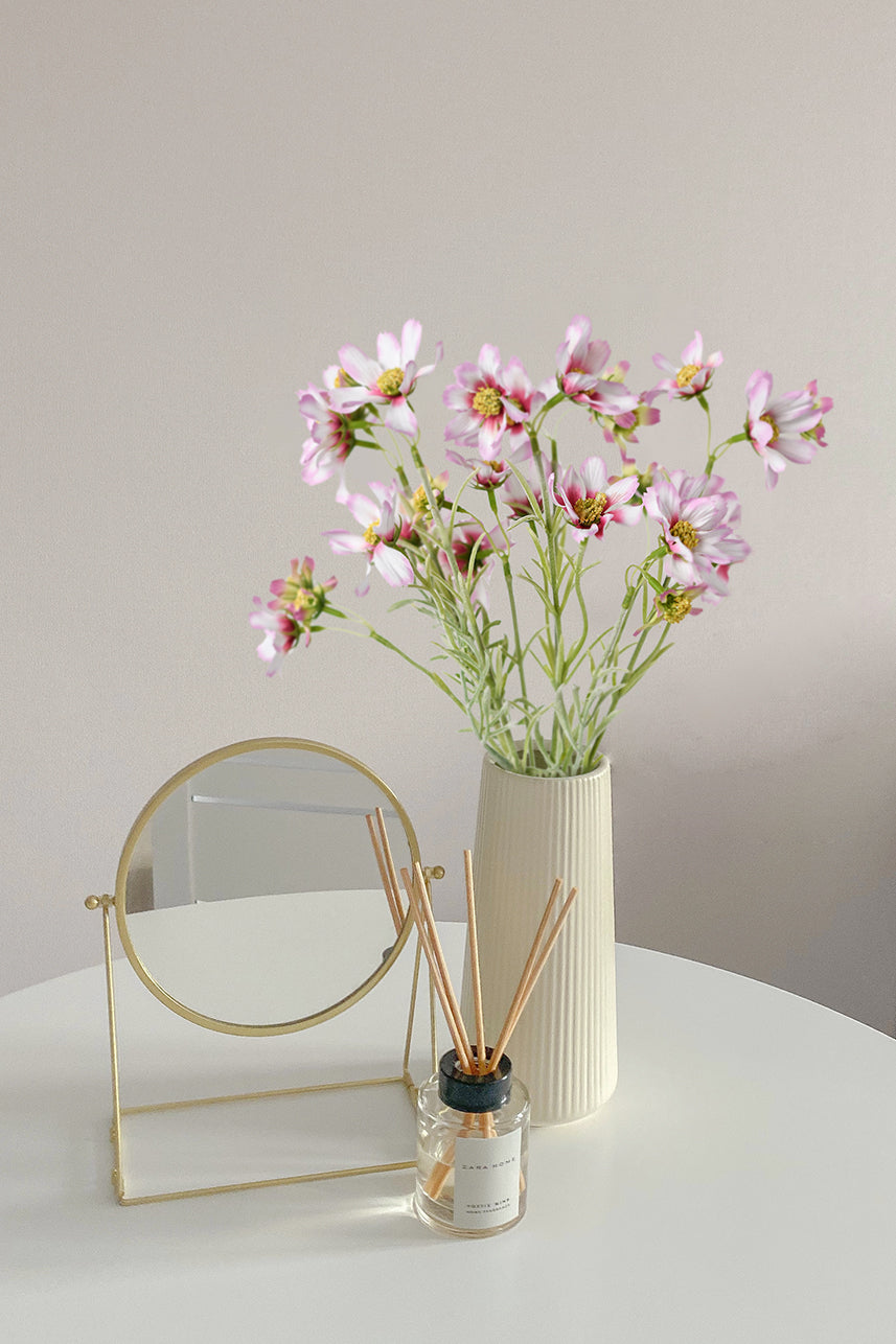 Their graceful petals and soft hues create a mesmerizing display that adds a touch of elegance to any setting.