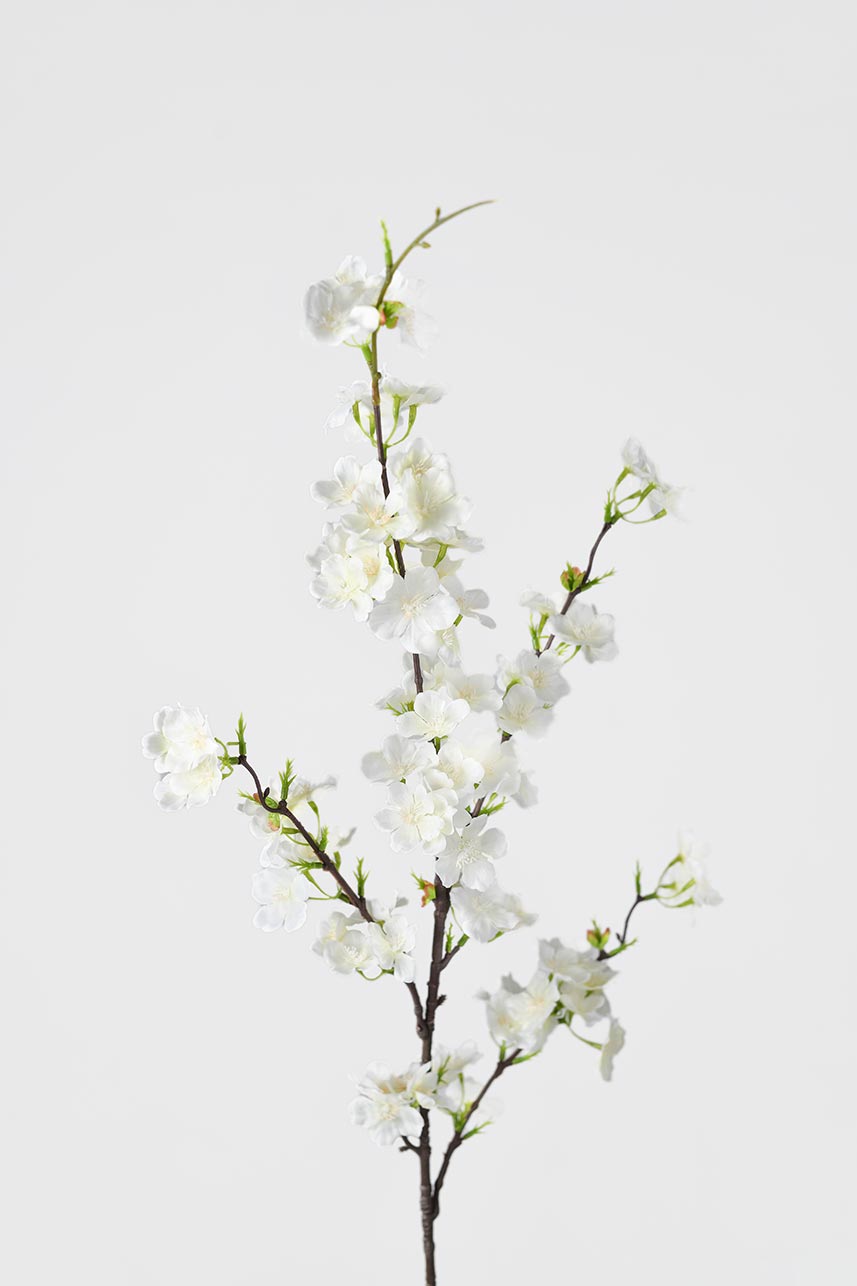 Faux cream white cherry blossom branch is an elegant accent featuring 5 blooming branch flowers.