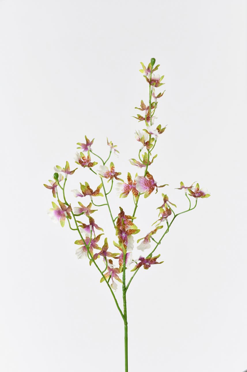 A lifelike artificial oncidium in white and green with detailed petals and leaves.