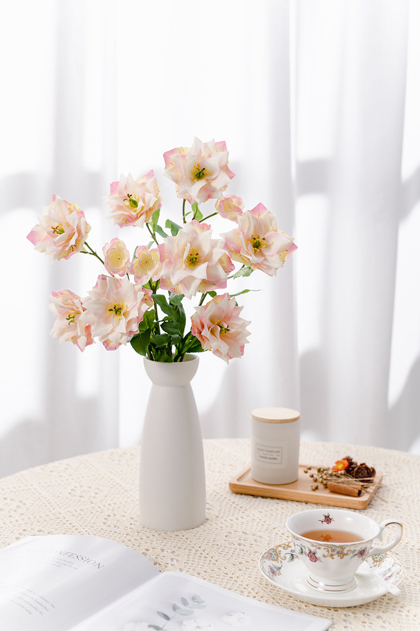 The intersection of the faux petals and stamens transitions through creamy white and yellow-green.Put the faux clematis on your bedside table or coffee table, It will stay with you all day long.