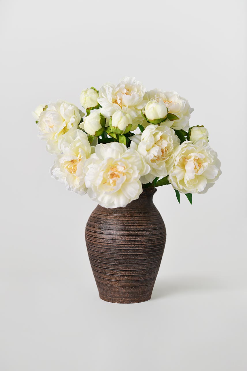 Pretty and life-like cream white phoenix peony flowers with bright green realistic leaves, fancy a fresh from the garden feel.