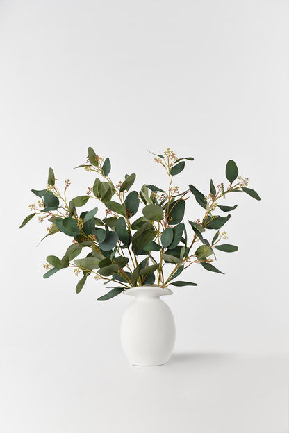 Faux green artificial Parisian Eucalyptus leaves, 28-inch tall in vase.