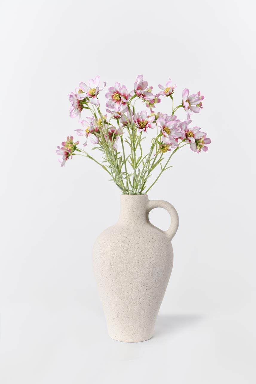 Realistic silk pink-white cosmos flowers arranged in a vase, adding natural charm to any space.