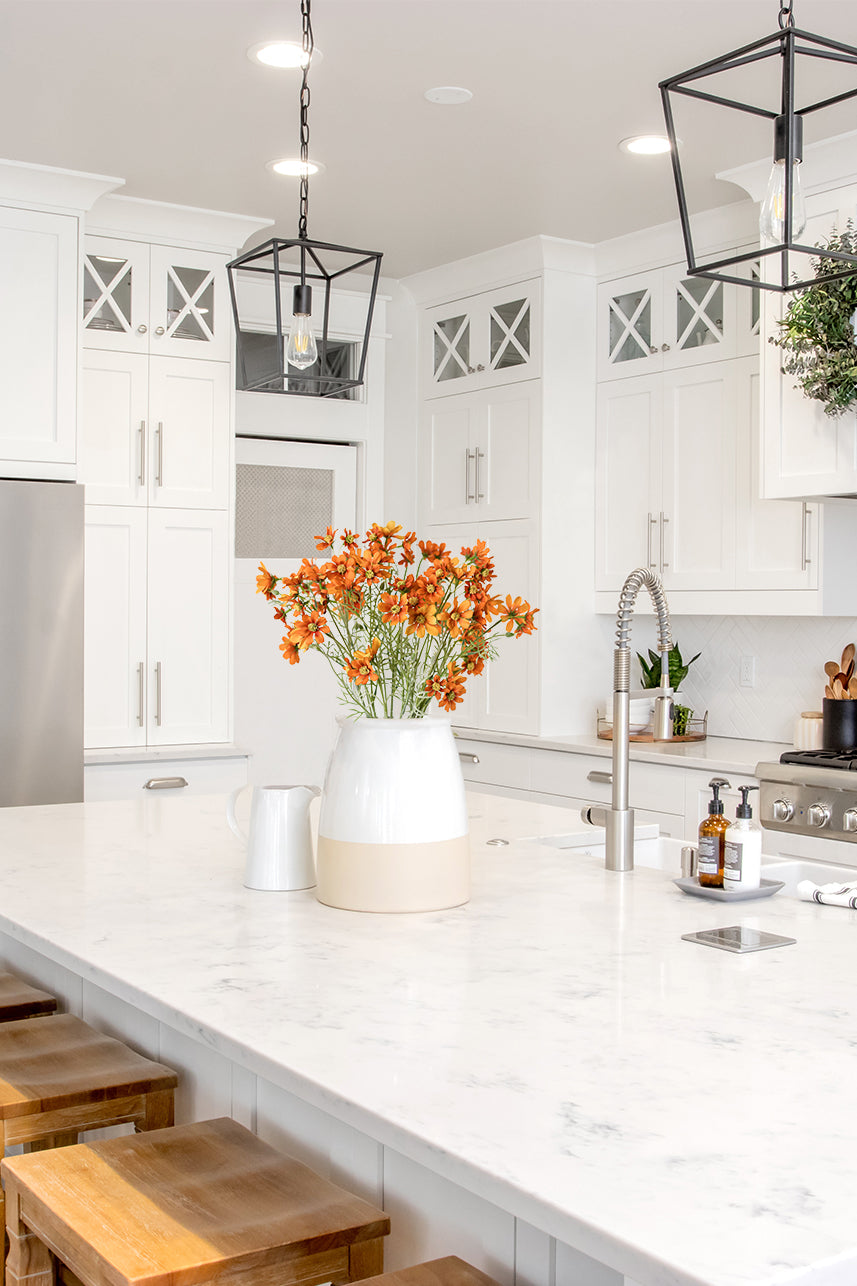 Faux orange Cosmos flowers with 17 large blooms, 2 budding flower, and lifelike green leaves dinning room decor.